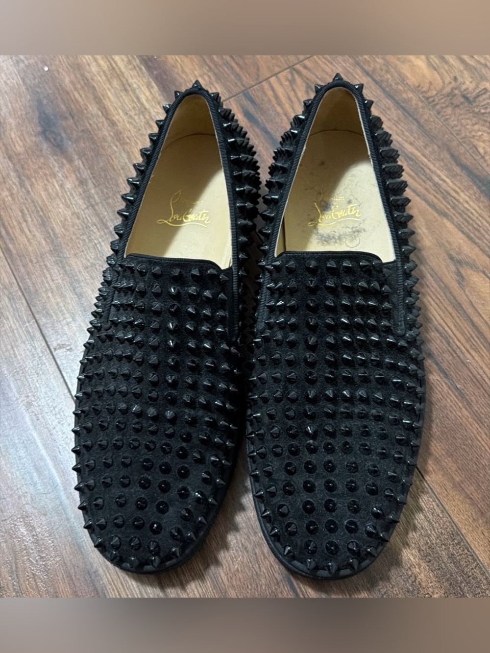 Christian Louboutin Men's Black Spiked Slip-Ons with Red Soles